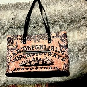 Halloween/Ouija Board themed zip up tote bag with front zipper pocket.
